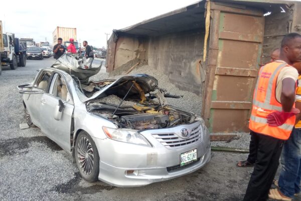 Truck Crushes Toyota at Eleko; Husband Dead, Wife Critical.