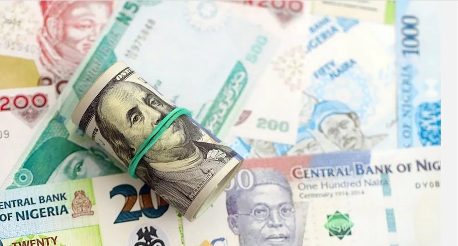 Naira Slumps as Corporate Dollar Demand Surges